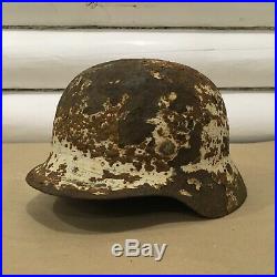 WW2 German Helmet M35 Wehrmacht Stahlhelm in winter camo coat