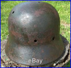 WW2 German Helmet M40/64 with bullet damage. Stahlhelm Original Relic