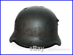 WW2 German Helmet M40 Size 64 with Dog Tag & Gas Mask Canister. World War II