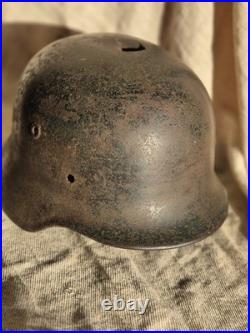 WW2 German Helmet M40 model, big size66 maker -NS-, genuine paint, battle damage