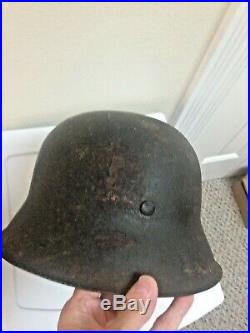 WW2 German Helmet Van Hoof with leather liner, chin strap, partial decal on side