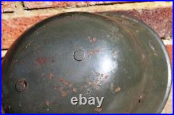 WW2 German M34 Helmet used like a combat helmet, good condition