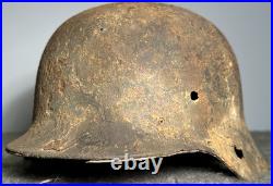 WW2 German M35 Helmet. Size 64. Battle-Damaged Relic. Found in Estonia WW2 German M35 Helmet. Size 64. Battle-Damaged Relic. Found in Estonia