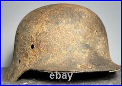 WW2 German M35 Helmet. Size 64. Battle-Damaged Relic. Found in Estonia WW2 German M35 Helmet. Size 64. Battle-Damaged Relic. Found in Estonia