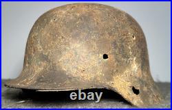 WW2 German M35 Helmet. Size 64. Battle-Damaged Relic. Found in Estonia WW2 German M35 Helmet. Size 64. Battle-Damaged Relic. Found in Estonia