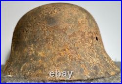 WW2 German M35 Helmet. Size 64. Battle-Damaged Relic. Found in Estonia WW2 German M35 Helmet. Size 64. Battle-Damaged Relic. Found in Estonia