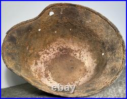 WW2 German M35 Helmet. Size 64. Battle-Damaged Relic. Found in Estonia WW2 German M35 Helmet. Size 64. Battle-Damaged Relic. Found in Estonia