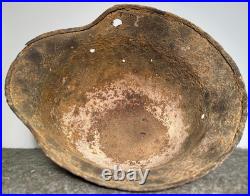 WW2 German M35 Helmet. Size 64. Battle-Damaged Relic. Found in Estonia WW2 German M35 Helmet. Size 64. Battle-Damaged Relic. Found in Estonia