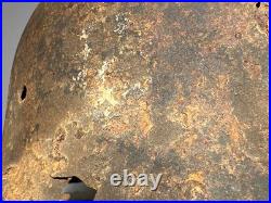 WW2 German M35 Helmet. Size 64. Battle-Damaged Relic. Found in Estonia WW2 German M35 Helmet. Size 64. Battle-Damaged Relic. Found in Estonia