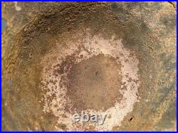 WW2 German M35 Helmet. Size 64. Battle-Damaged Relic. Found in Estonia WW2 German M35 Helmet. Size 64. Battle-Damaged Relic. Found in Estonia