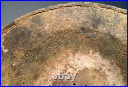 WW2 German M35 Helmet. Size 64. Battle-Damaged Relic. Found in Estonia WW2 German M35 Helmet. Size 64. Battle-Damaged Relic. Found in Estonia