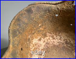 WW2 German M35 Helmet. Size 64. Battle-Damaged Relic. Found in Estonia WW2 German M35 Helmet. Size 64. Battle-Damaged Relic. Found in Estonia