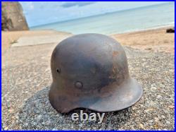 WW2 German M40 Helmet with liner, a lot of paint, Normandy trip WW2 German M40 Helmet with liner, a lot of paint, Normandy trip