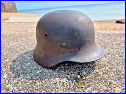 WW2 German M40 Helmet with liner, a lot of paint, Normandy trip WW2 German M40 Helmet with liner, a lot of paint, Normandy trip