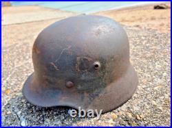 WW2 German M40 Helmet with liner, a lot of paint, Normandy trip WW2 German M40 Helmet with liner, a lot of paint, Normandy trip