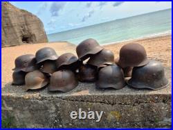 WW2 German M40 Helmet with liner, a lot of paint, Normandy trip WW2 German M40 Helmet with liner, a lot of paint, Normandy trip