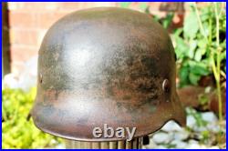 WW2 German M40 Helmet with liner, a lot of paint, Normandy trip WW2 German M40 Helmet with liner, a lot of paint, Normandy trip