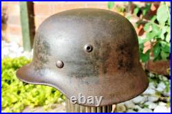 WW2 German M40 Helmet with liner, a lot of paint, Normandy trip WW2 German M40 Helmet with liner, a lot of paint, Normandy trip