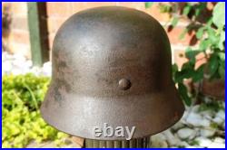WW2 German M40 Helmet with liner, a lot of paint, Normandy trip WW2 German M40 Helmet with liner, a lot of paint, Normandy trip