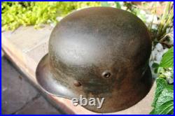 WW2 German M40 Helmet with liner, a lot of paint, Normandy trip WW2 German M40 Helmet with liner, a lot of paint, Normandy trip