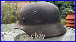 WW2 German Wehrmacht M40 combat helmet. Original and complete, as found