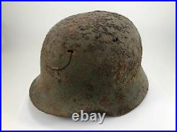 WW2 German original entourage combat helmet M35 with owner's signature. Size 66