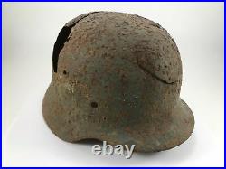 WW2 German original entourage combat helmet M35 with owner's signature. Size 66