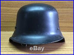 WW2 German volcano fiber parade helmet complete with liner and chin strap. M34