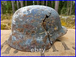 WW2 ORIGINAL GERMAN M35 ET66 WINTER CAMO BATTLEDAMAGED HELMET RELIC from KURLAND WW2 ORIGINAL GERMAN M35 ET66 WINTER CAMO BATTLEDAMAGED HELMET RELIC from KURLAND