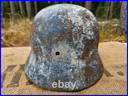 WW2 ORIGINAL GERMAN M35 ET66 WINTER CAMO BATTLEDAMAGED HELMET RELIC from KURLAND WW2 ORIGINAL GERMAN M35 ET66 WINTER CAMO BATTLEDAMAGED HELMET RELIC from KURLAND