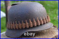 WW2 WWII Original German Helmet M35 (battle demages)from the battlefield. Kurland