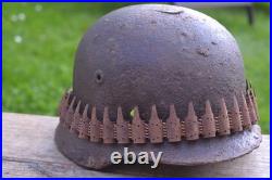 WW2 WWII Original German Helmet M35 (battle demages)from the battlefield. Kurland