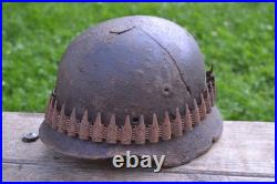 WW2 WWII Original German Helmet M35 (battle demages)from the battlefield. Kurland