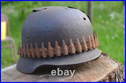 WW2 WWII Original German Helmet M35 (battle demages)from the battlefield. Kurland