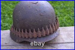 WW2 WWII Original German Helmet M35 (battle demages)from the battlefield. Kurland