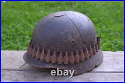WW2 WWII Original German Helmet M35 (battle demages)from the battlefield. Kurland