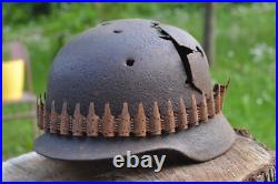 WW2 WWII Original German Helmet M35 (battle demages)from the battlefield. Kurland
