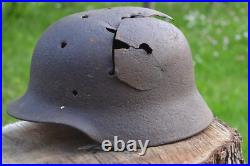 WW2 WWII Original German Helmet M35 (battle demages)from the battlefield. Kurland