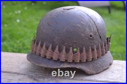 WW2 WWII Original German Helmet M35 (battle demages)from the battlefield. Kurland
