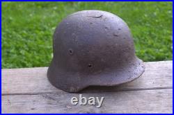 WW2 WWII Original German Helmet M35 (battle demages)from the battlefield. Kurland