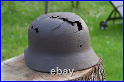 WW2 WWII Original German Helmet M35 (battle demages)from the battlefield. Kurland