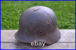 WW2 WWII Original German Helmet M35 (battle demages)from the battlefield. Kurland
