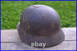 WW2 WWII Original German Helmet M35 (battle demages)from the battlefield. Kurland