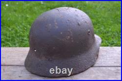 WW2 WWII Original German Helmet M35 (battle demages)from the battlefield. Kurland