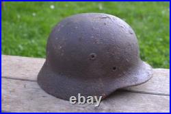 WW2 WWII Original German Helmet M35 (battle demages)from the battlefield. Kurland