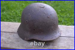 WW2 WWII Original German Helmet M35 (battle demages)from the battlefield. Kurland