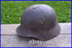 WW2 WWII Original German Helmet M35 (battle demages)from the battlefield. Kurland
