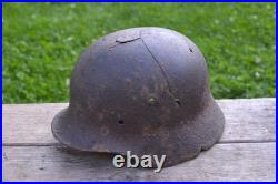WW2 WWII Original German Helmet M35 (battle demages)from the battlefield. Kurland