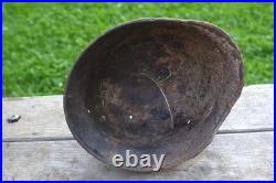 WW2 WWII Original German Helmet M35 (battle demages)from the battlefield. Kurland
