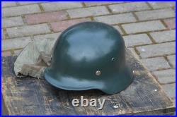 WW2 WWII Original German relic from the battlefield, Helmet with Cover, M35